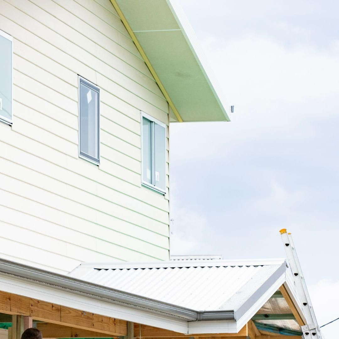 A White House with A Ladder in Front of It — Jonobilt in Charlestown, NSW