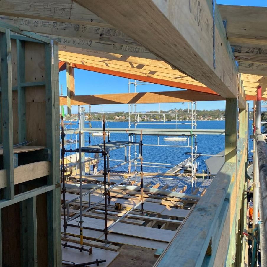 A Building Under Construction with A View of A Body of Water — Jonobilt in Cameron Park, NSW