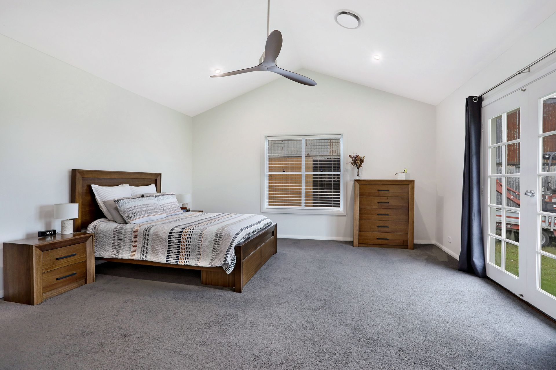 A Wooden Bedroom Set with Ceiling Fan — Jonobilt in Bolwarra, NSW