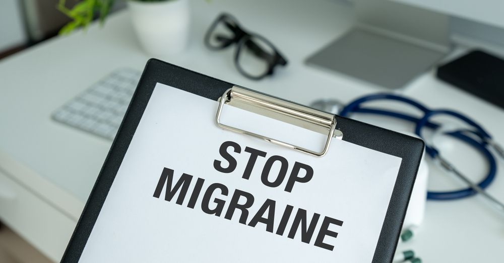 A clipboard with the words `` stop migraine '' written on it.
