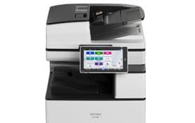 Modern multifunction office printer with touchscreen display and open paper tray