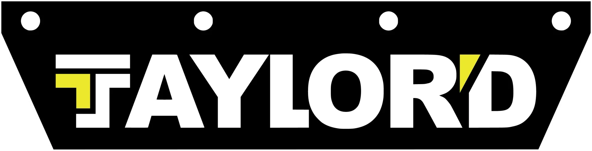TAYLORD logo in white and yellow on a black sign with circular holes on top and bottom edges