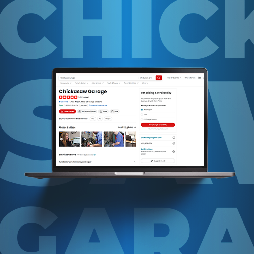 Laptop displaying a business website on a blue background with large “CHICKEN GARA...” text behind it