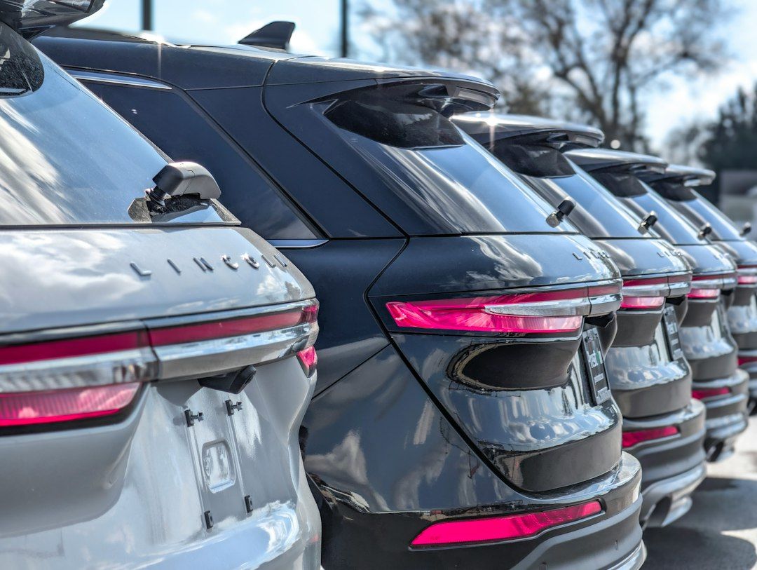 Row of Lincoln SUVs at a dealership, representing car dealership social media marketing.