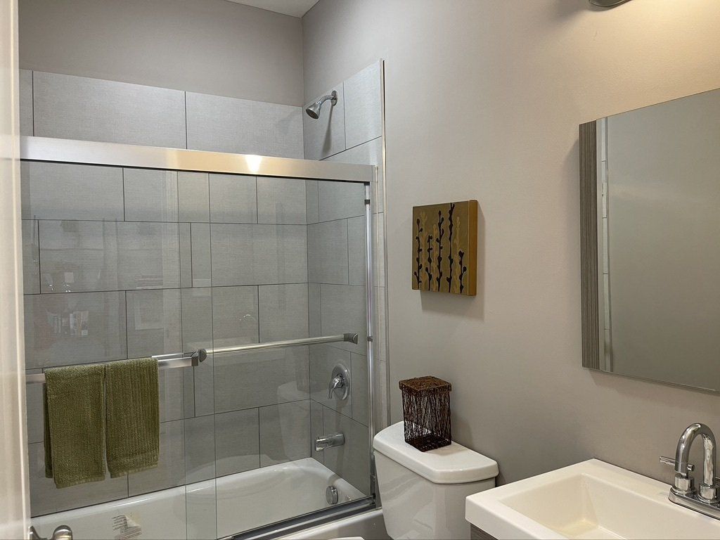Bathroom with tub and shower