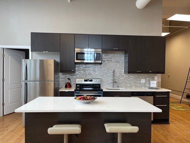 Unit kitchen with stainless steel appliances