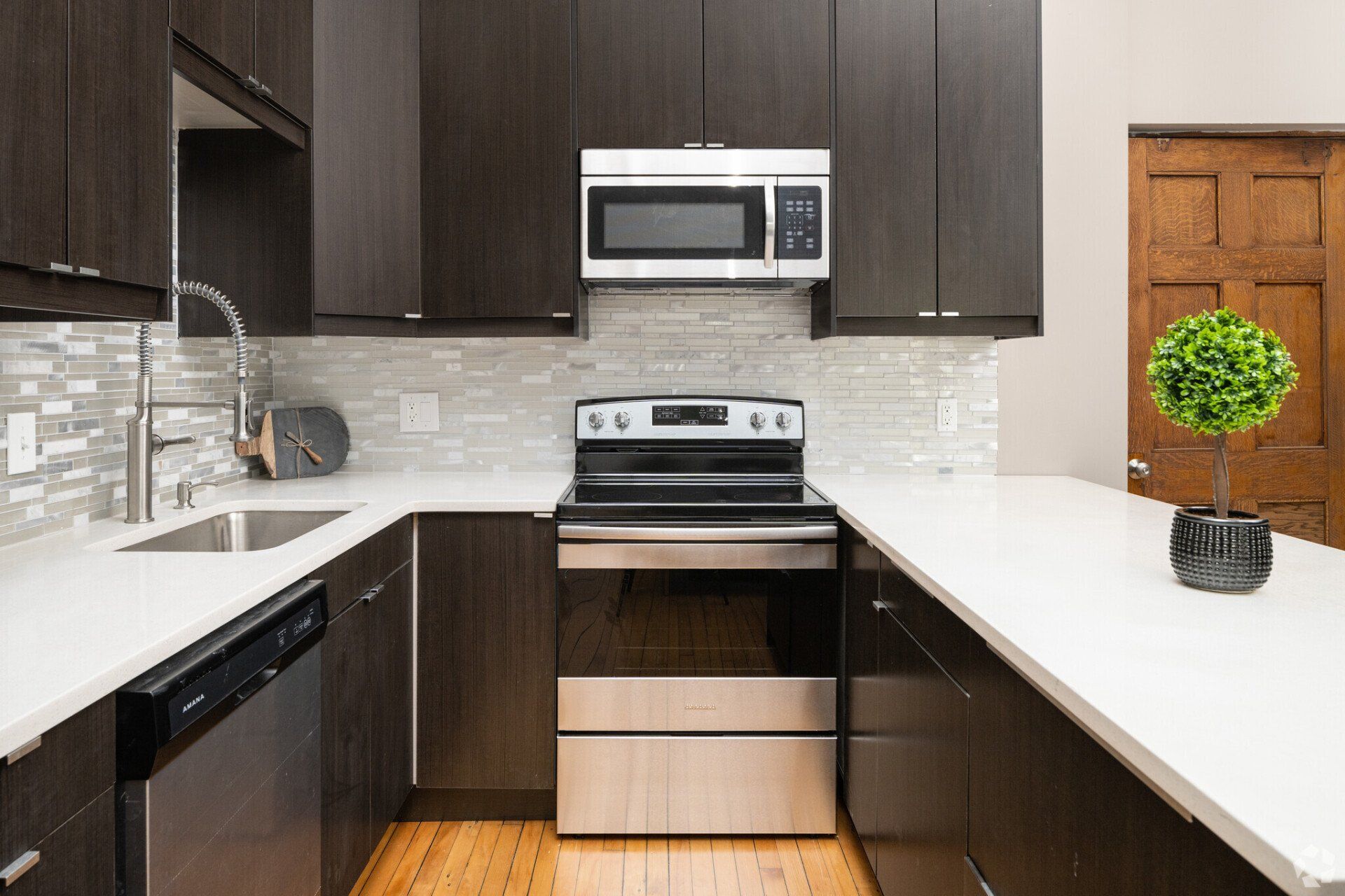 Unit kitchen with stainless steel appliances