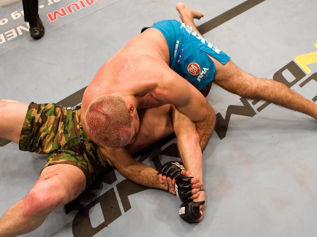 Elvis Sinosic fighting Michael Bisping in the UFC
