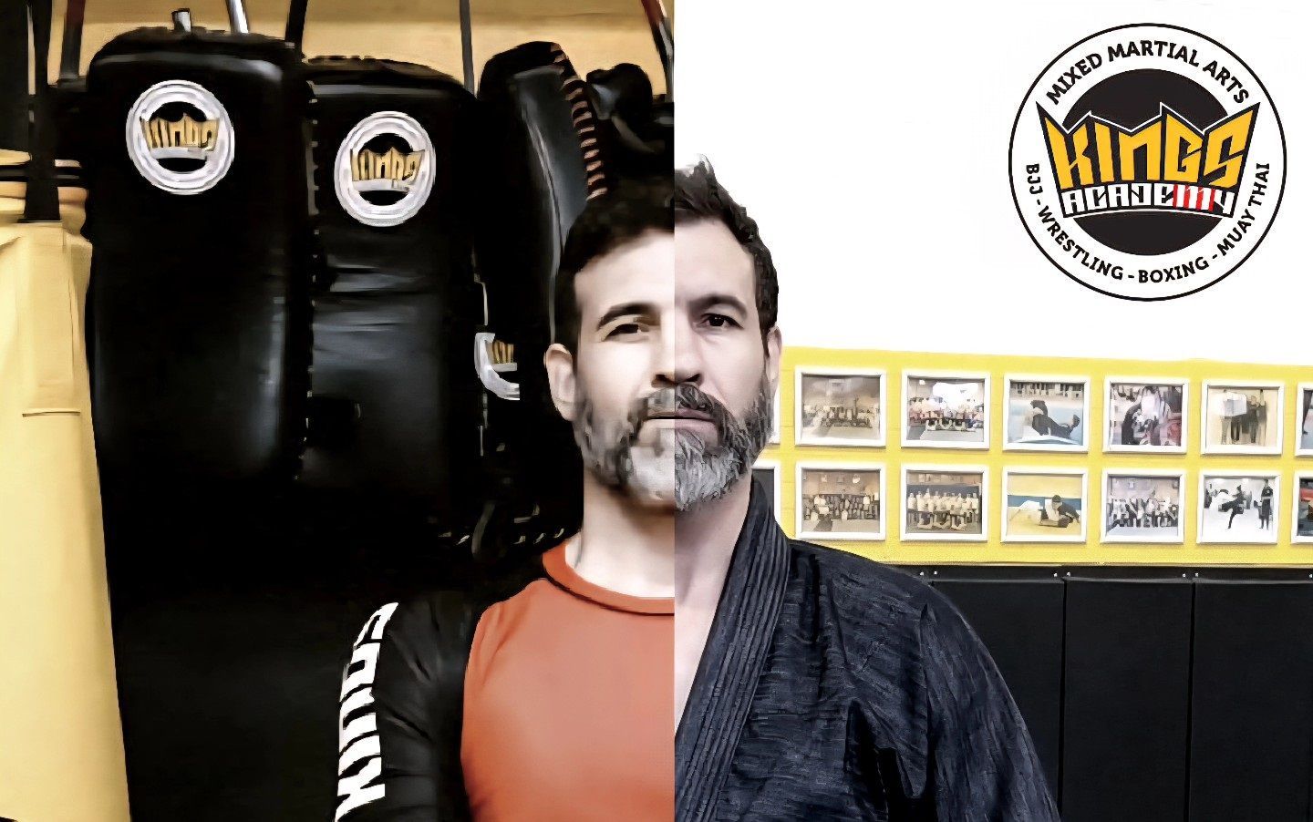 Man standing in a gym beside black punching bags and a wall sign, wearing an orange shirt and dark jacket.