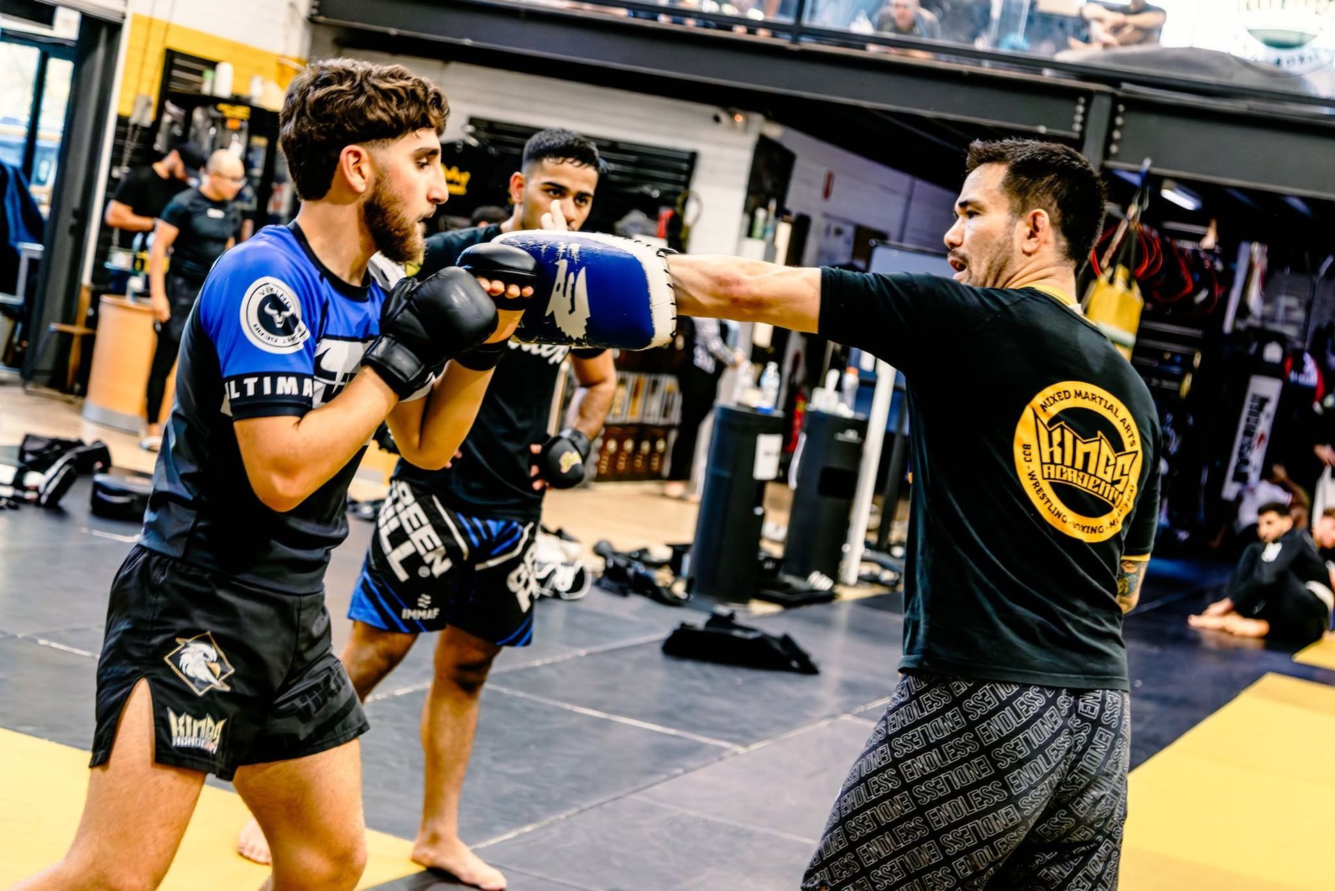 Coach Jesh teaching the MMA class