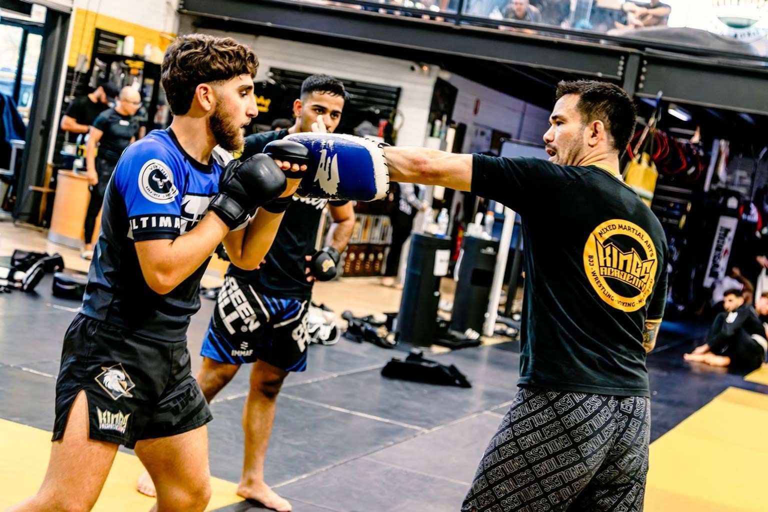 Coach Jesh teaching the MMA class