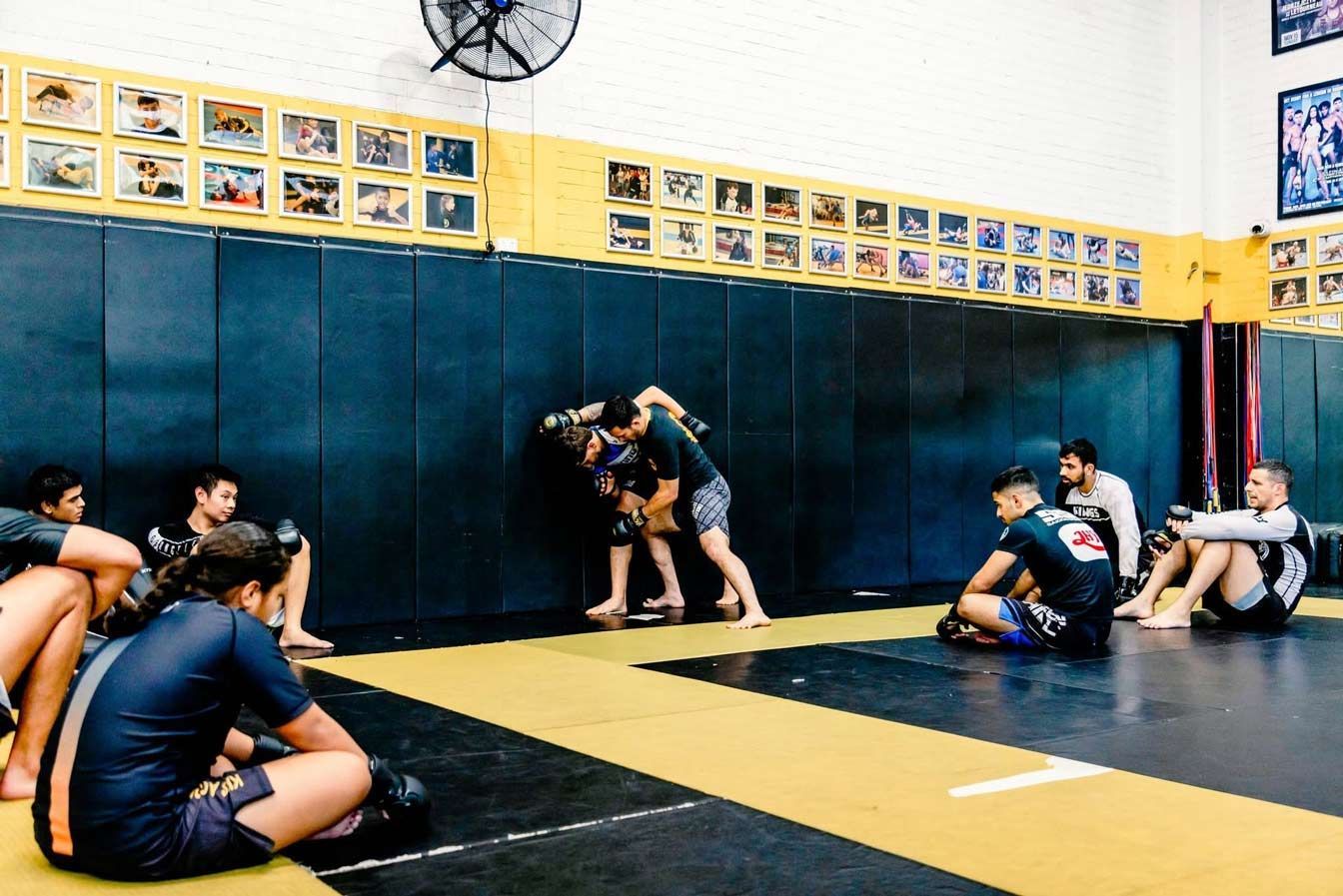 MMA Class learning Wall Fighting skills