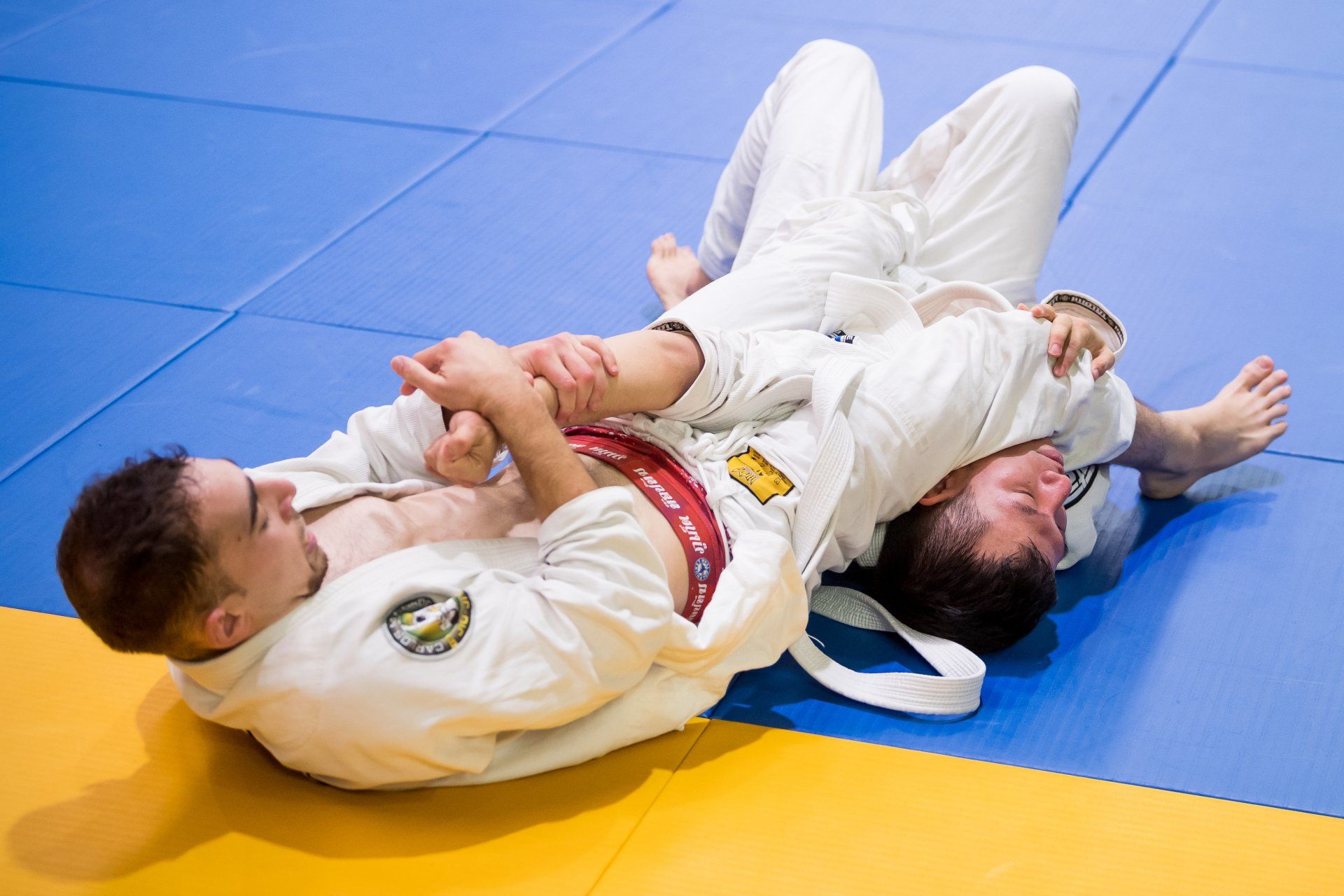 Kings Academy Student performing an Armbar in Brazilian Jiu Jitsu Competition in Sydney