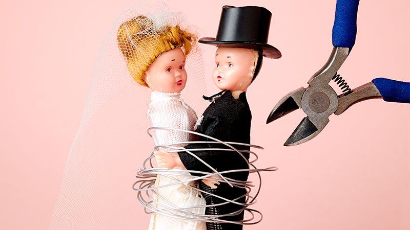 wedding figurines bound by wires