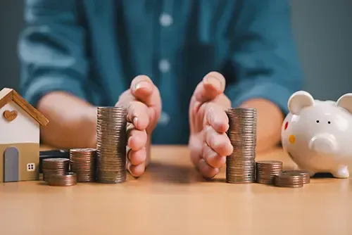 A person dividing assets with their hands