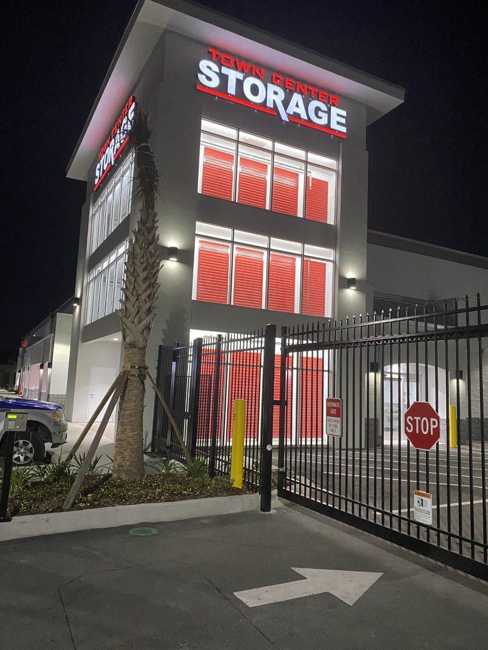 A storage building with a stop sign in front of it