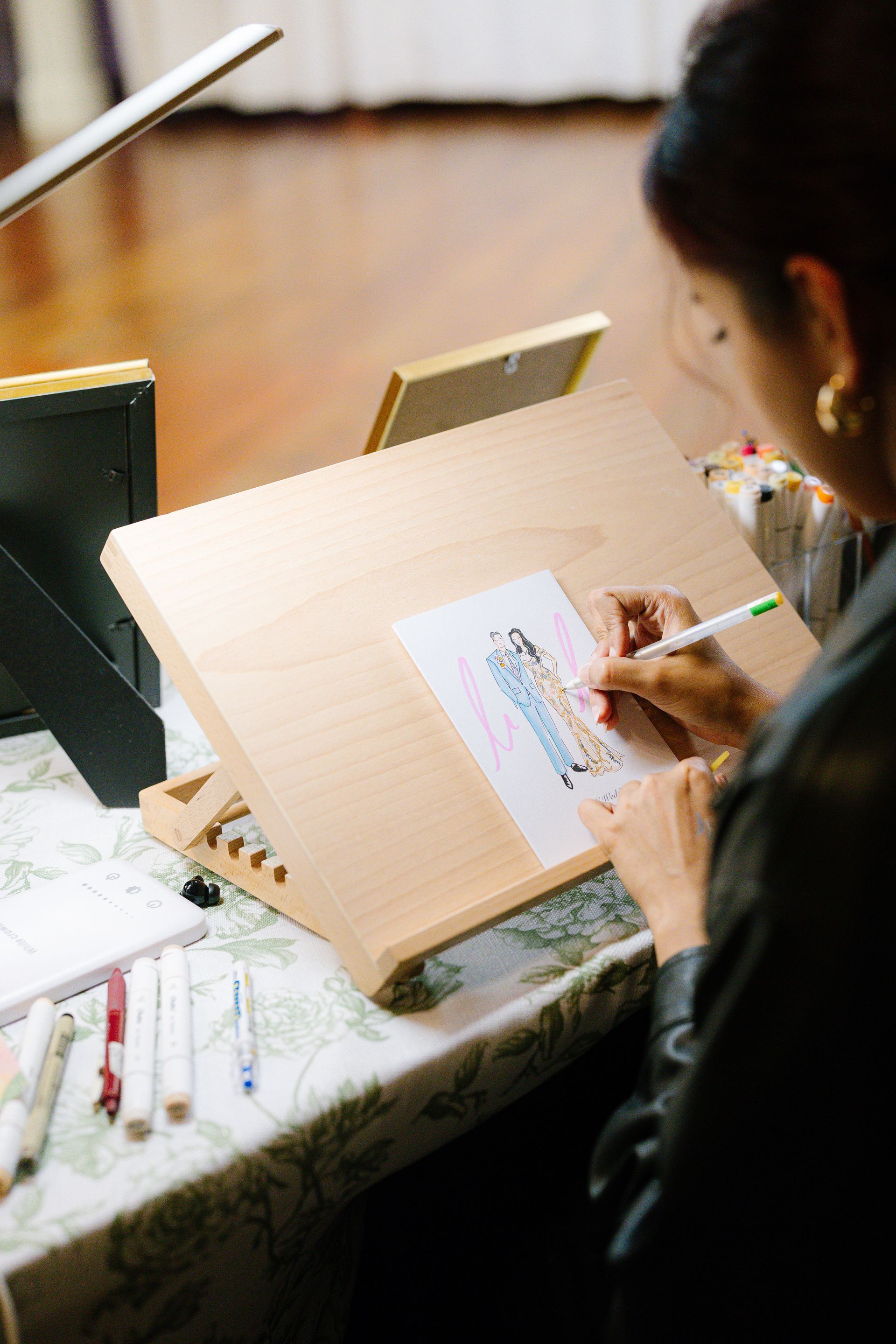 water color artist painting at a wedding in brenham, tx