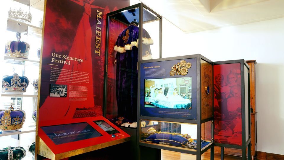 A museum display with a sign that says majesty on it