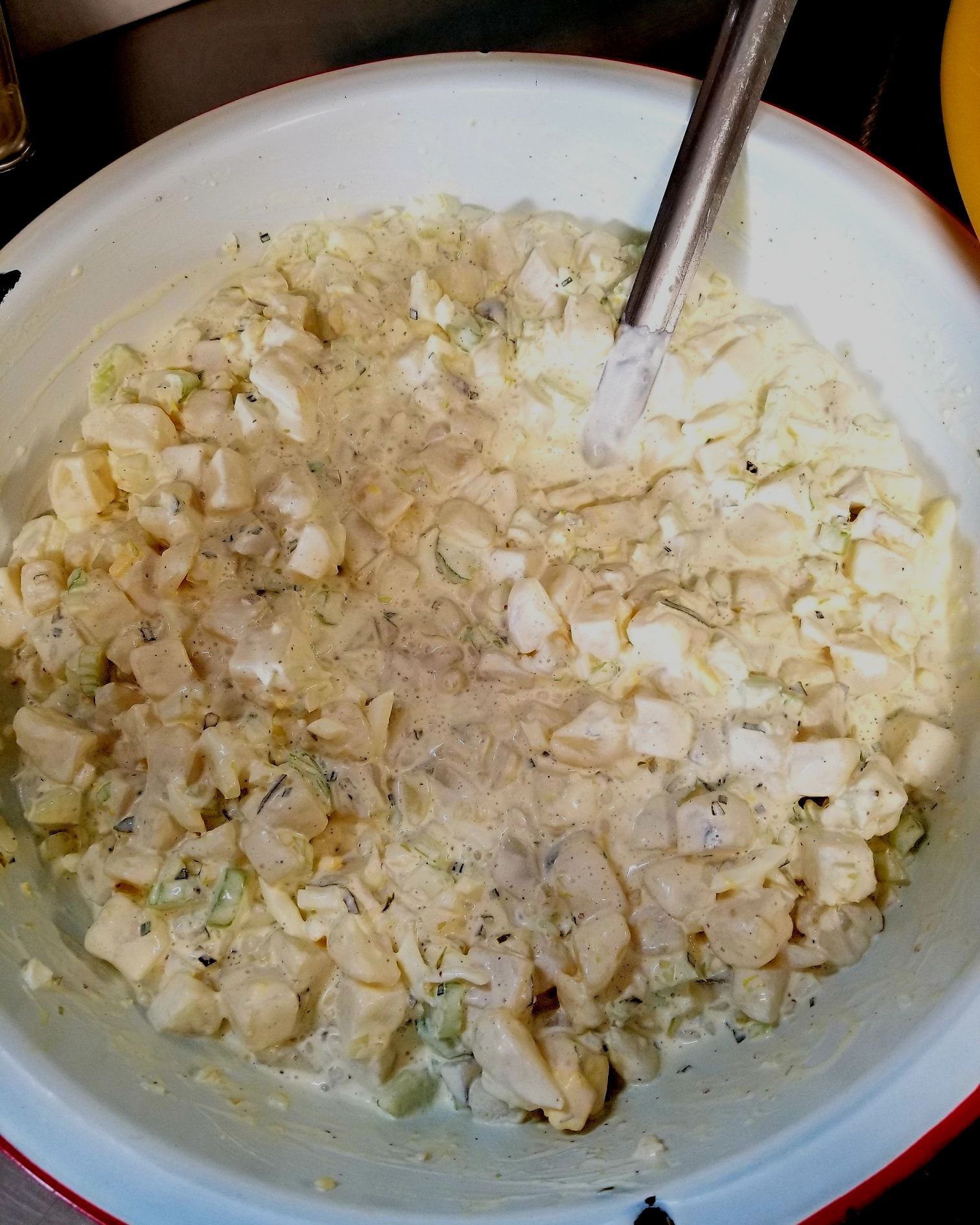 A bowl of food with a spoon in it
