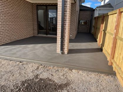 Expert concreters in Sunbury VIC working on a concrete flooring in a residential concreting project.