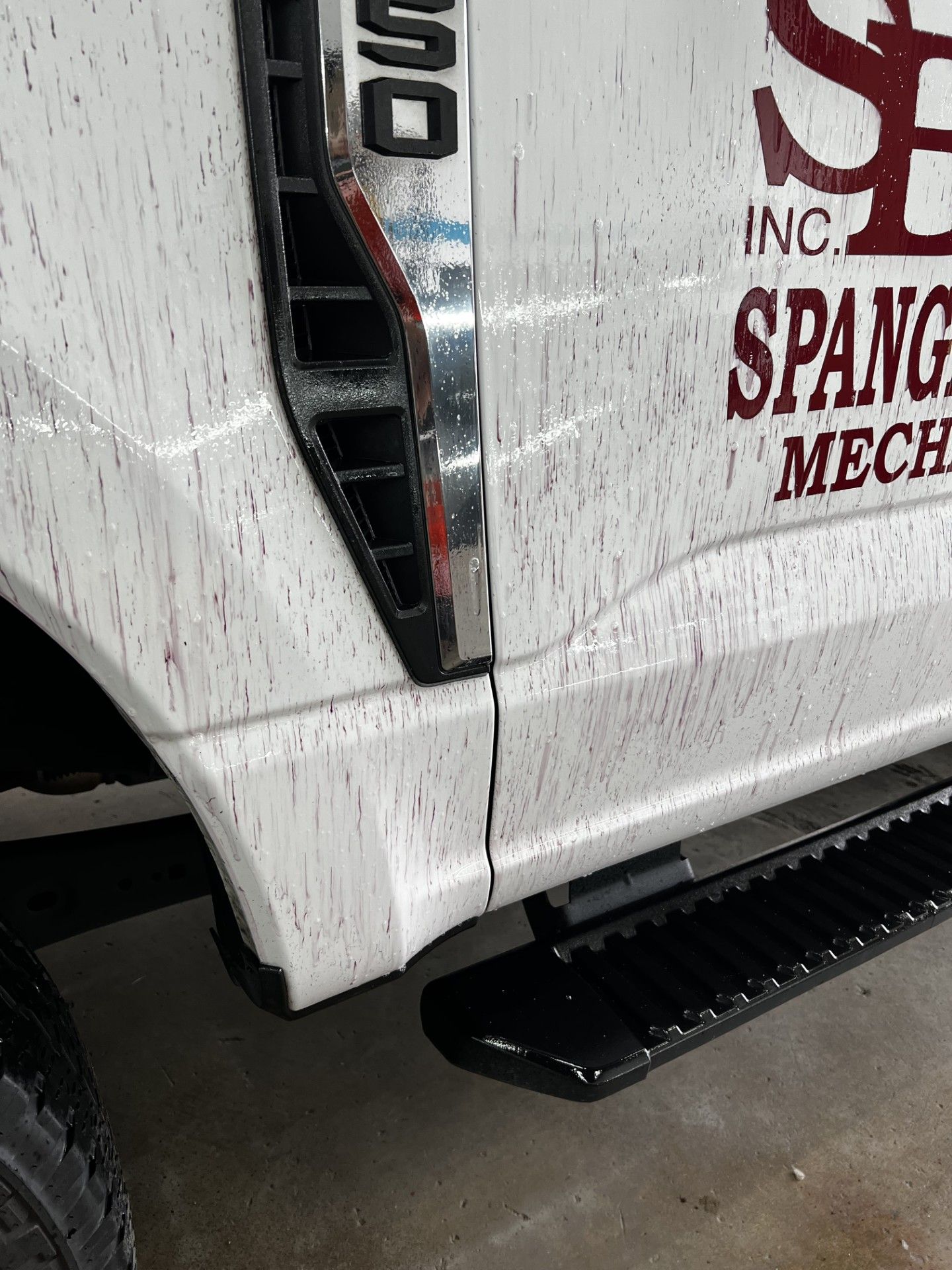 Rail dust and iron contamination removal on vehicle paint during chemical decontamination
