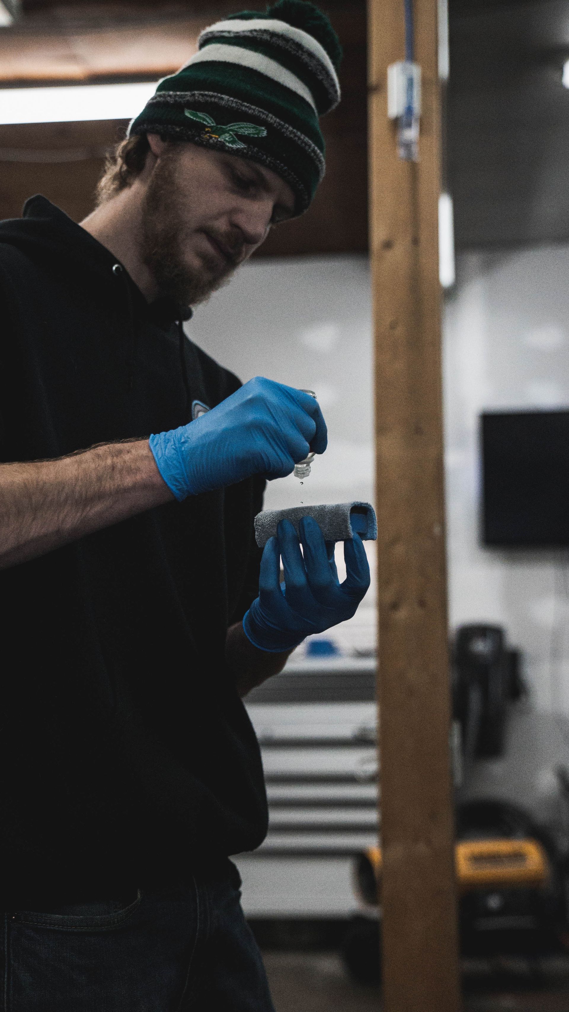 Detailer applying ceramic coating