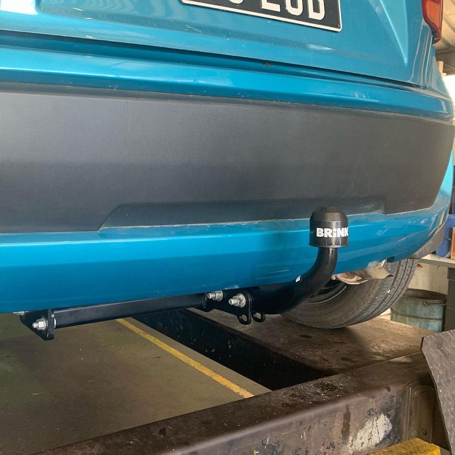 A Blue Car With A License Plate — Hannam Street Mufflers and Mechanical In Bungalow, QLD