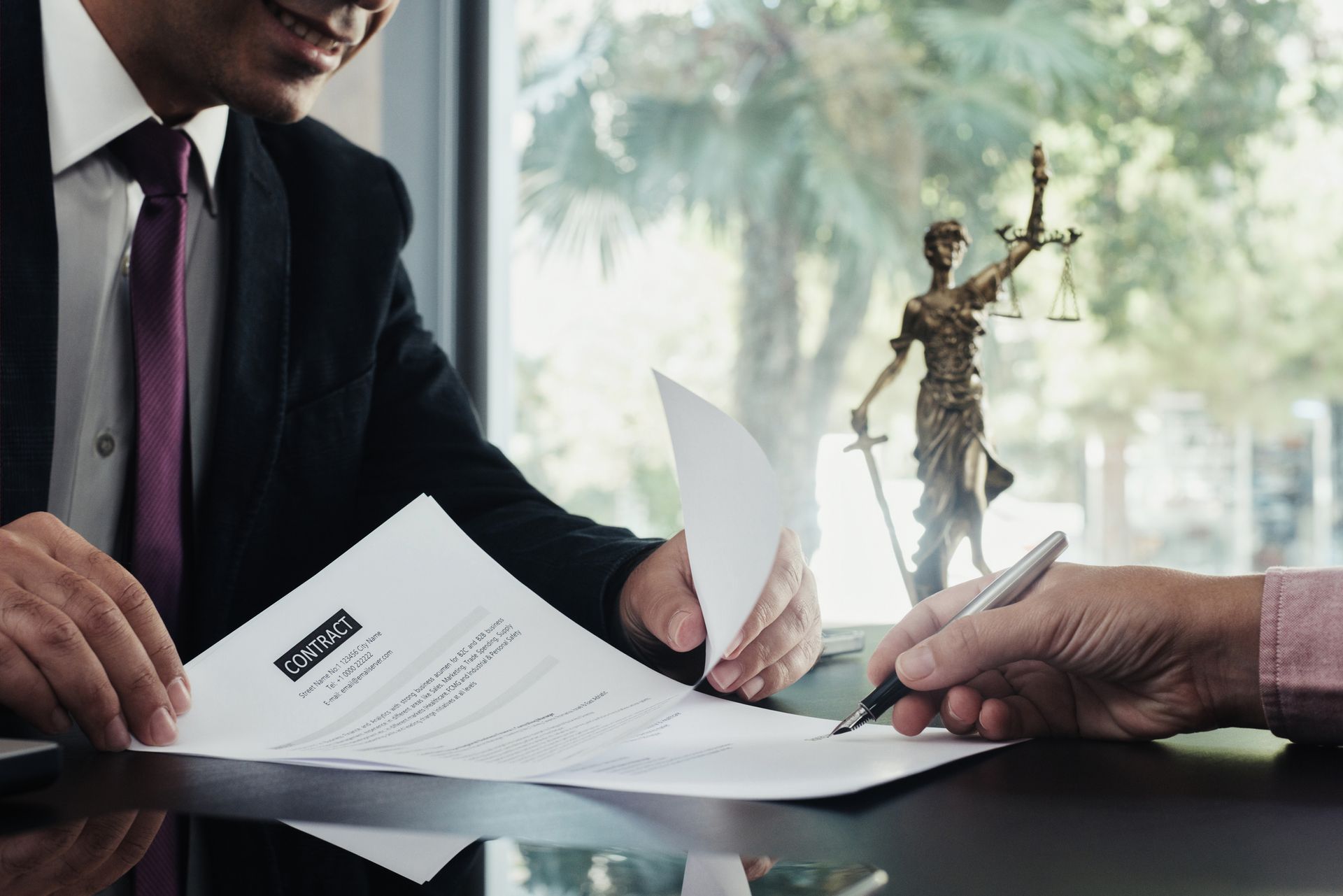 Lawyer and The Client Signing Legal Documents - Pasco Country, FL - Brads Bail Bonds