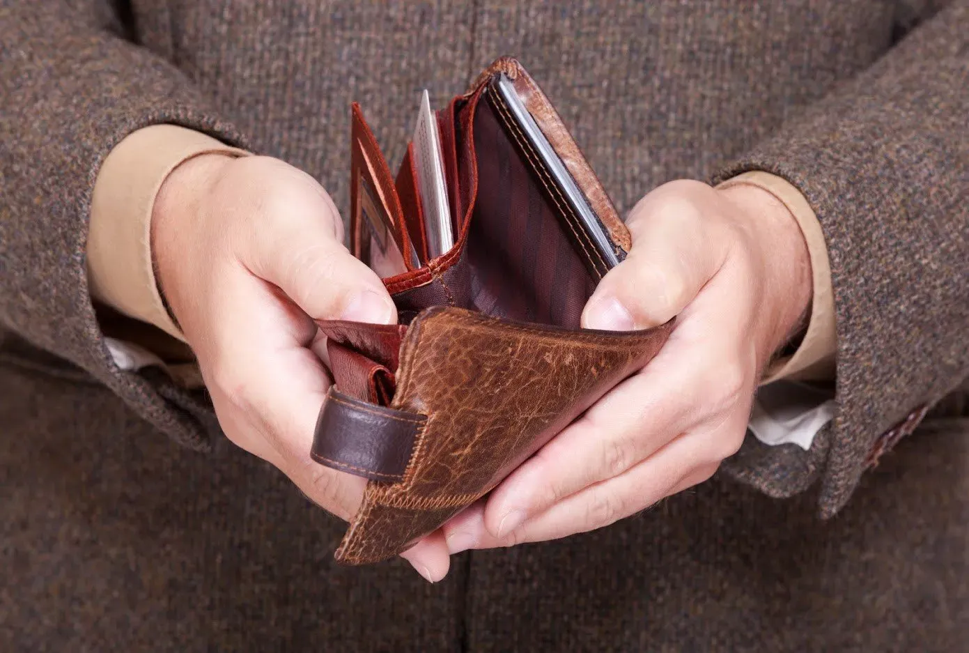 Man Checking His Wallet — New Port Richey, FL — Brad’s Bail Bonds
