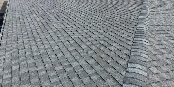 Gray asphalt shingle roof.