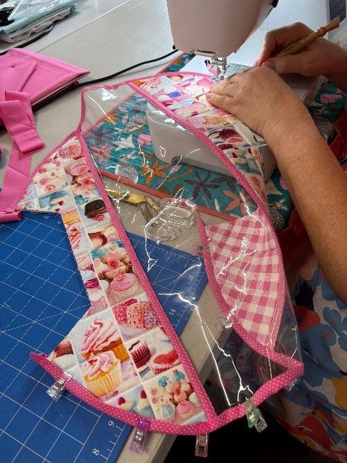A Person is Using a Sewing Machine to Make a Quilt — Lyn-Jelle Crafts in Emu Park, QLD