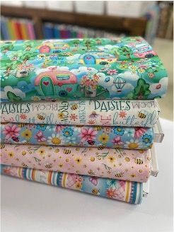 A Stack of Fabrics Sitting on Top of Each Other on a Table — Lyn-Jelle Crafts in Emu Park, QLD