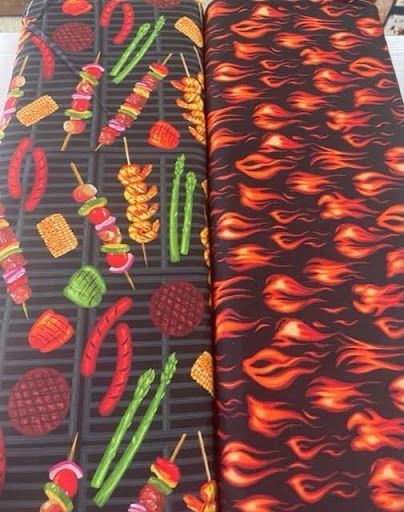 Two Pieces of Fabric With a Grill and Flames on Them — Lyn-Jelle Crafts in Emu Park, QLD
