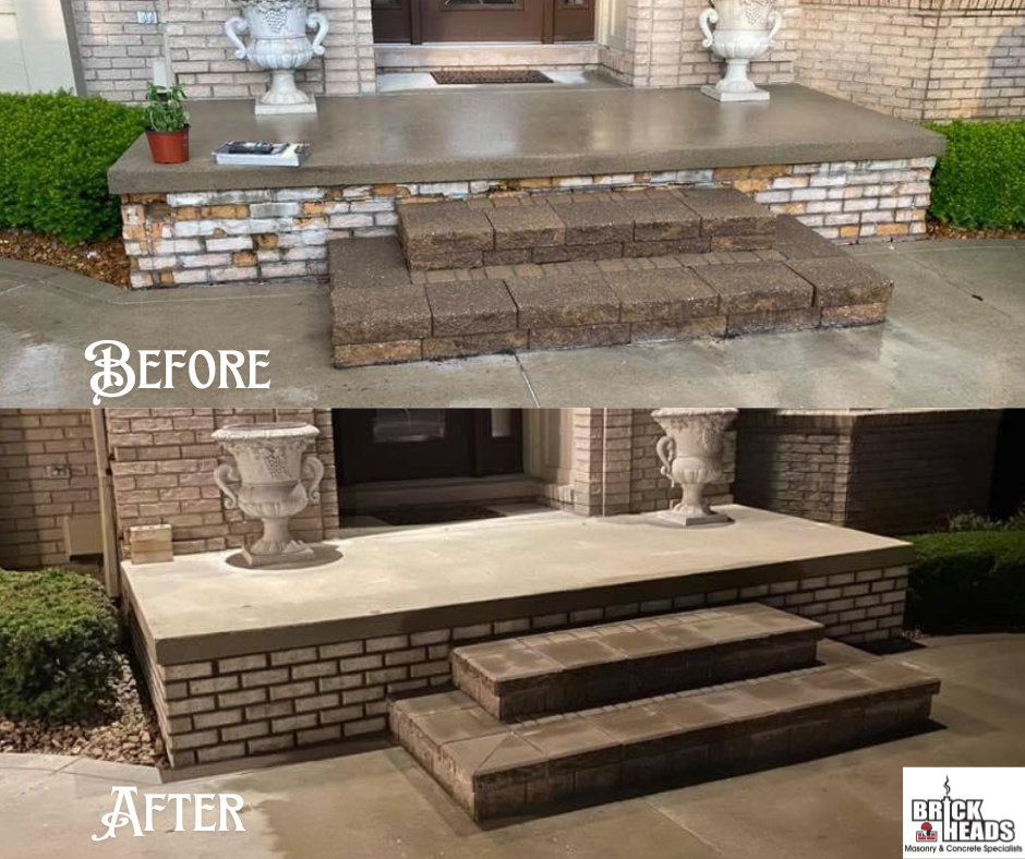 A brick house with a concrete porch and steps