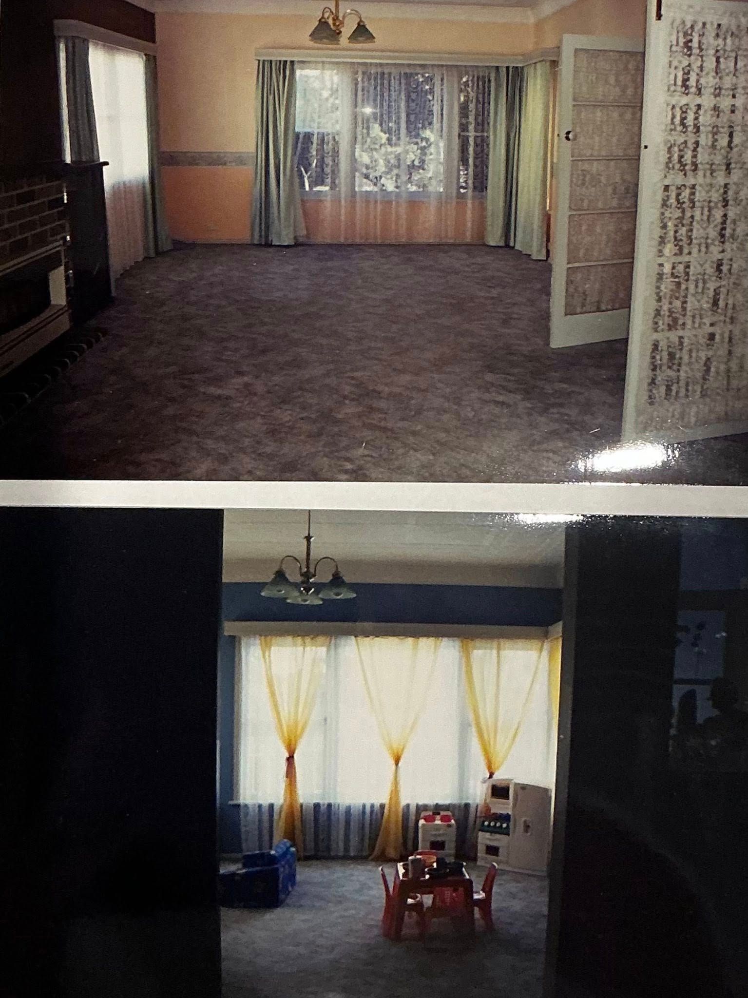 Two-room interior with empty carpeted floor and a bright windowed nook with chairs and curtains