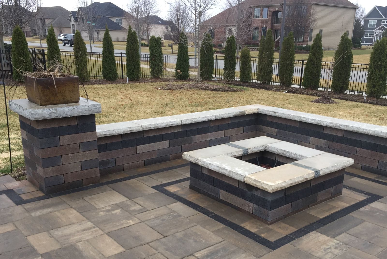 Brick paver patio with Block Seat wall and Pillars and Fire Pit in Arlington Heights IL. 