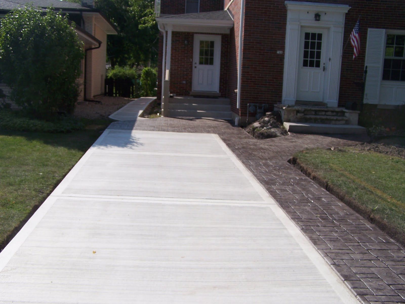 New concrete driveway installation for a residential property in Addison, IL.