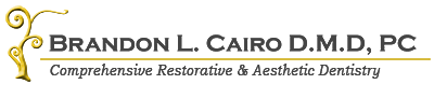 Logo for Brandon L. Cairo D.M.D., PC, a dentistry practice. Features decorative gold floral design.