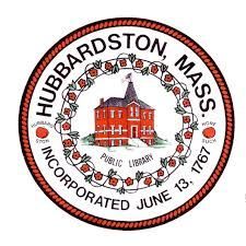 Seal of Hubbardston, Massachusetts, featuring a red building, floral garland, and text around the edge.