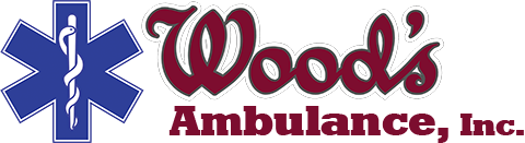 Logo for Woods Ambulance, Inc.: blue star of life symbol with a white medical staff, and maroon text.