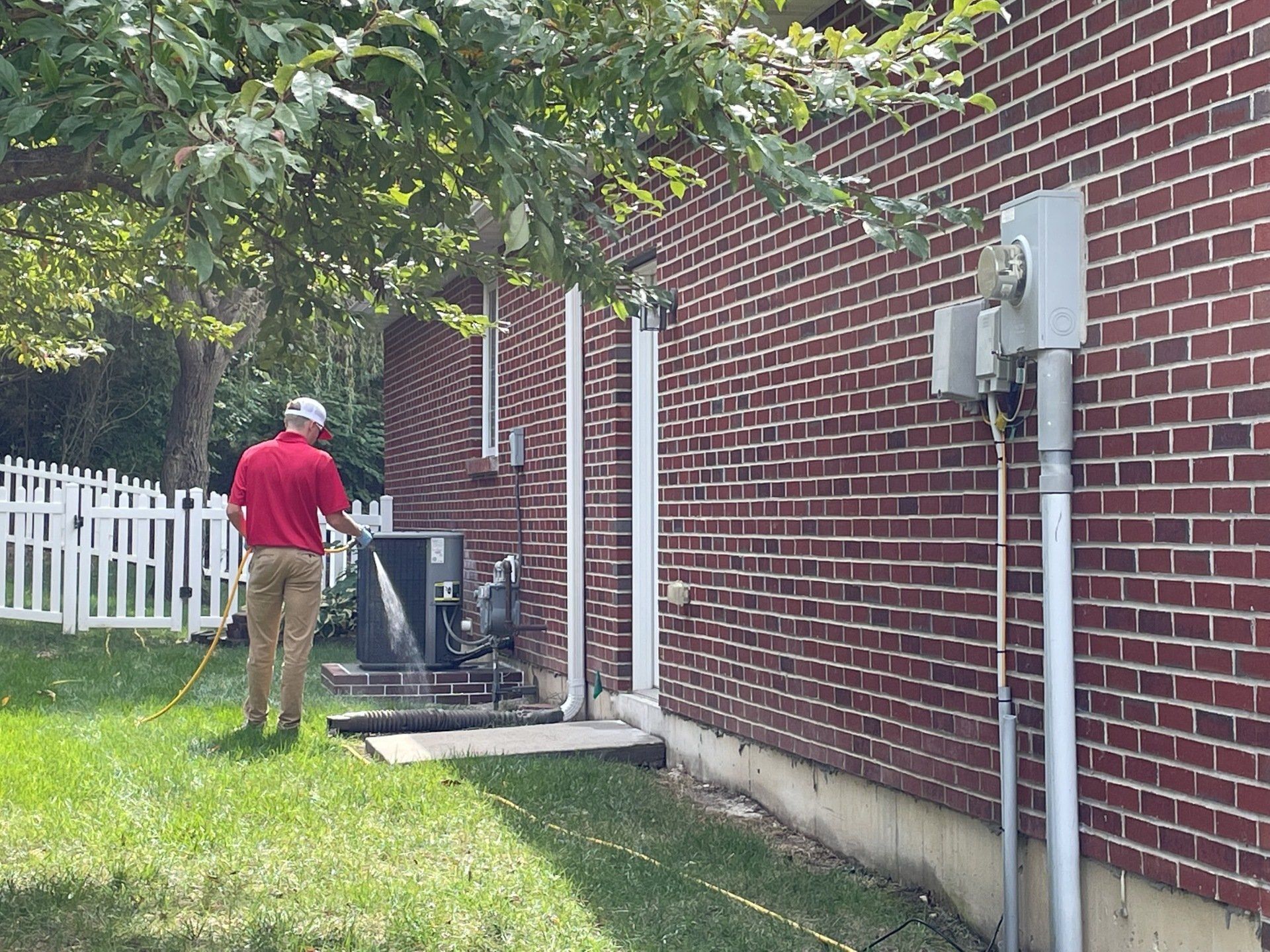 Spraying on doorstep — Jefferson City, MO — Art’s Pest Control
