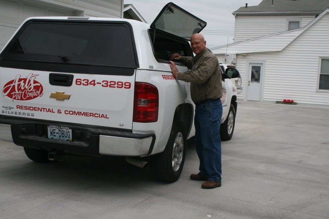 Owner with truck — Jefferson City, MO — Art’s Pest Control