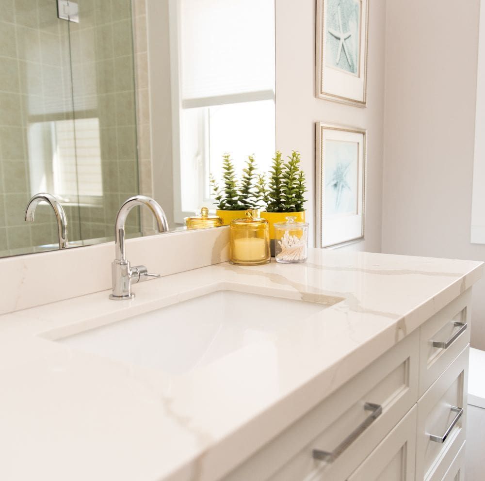 Bright white bathroom vanity after eco-friendly house cleaning