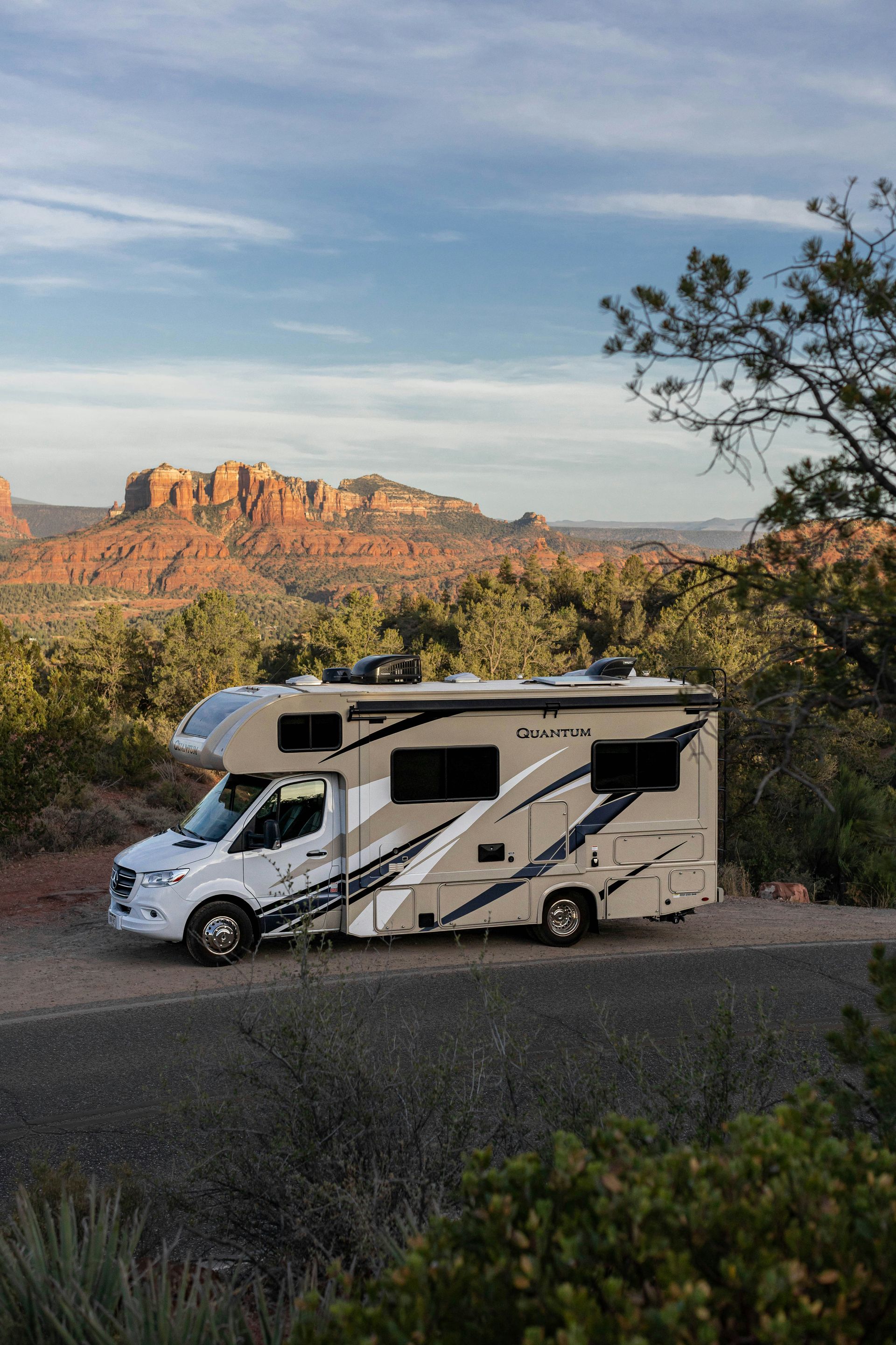 RV parked along a scenic desert road