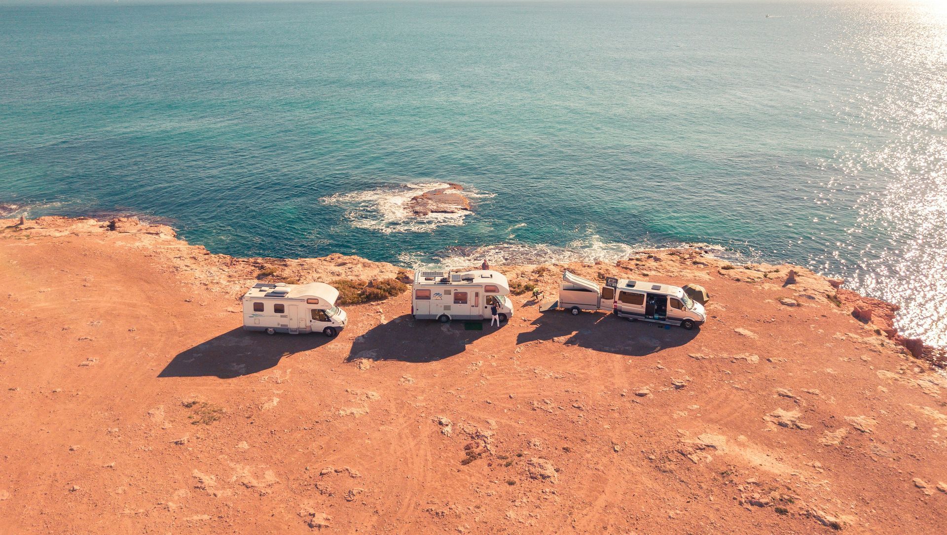 RVs parked along coastline