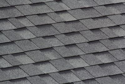 A close up of a roof with shingles on it.