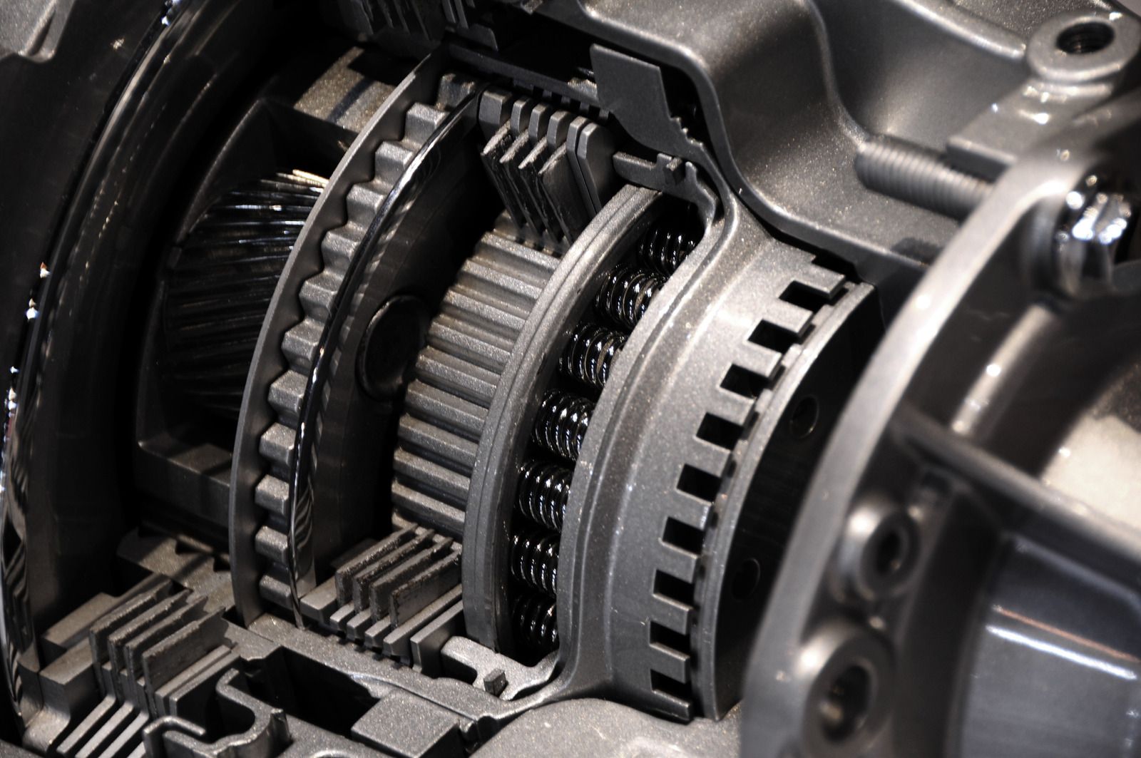 A close up of a gearbox in a car.