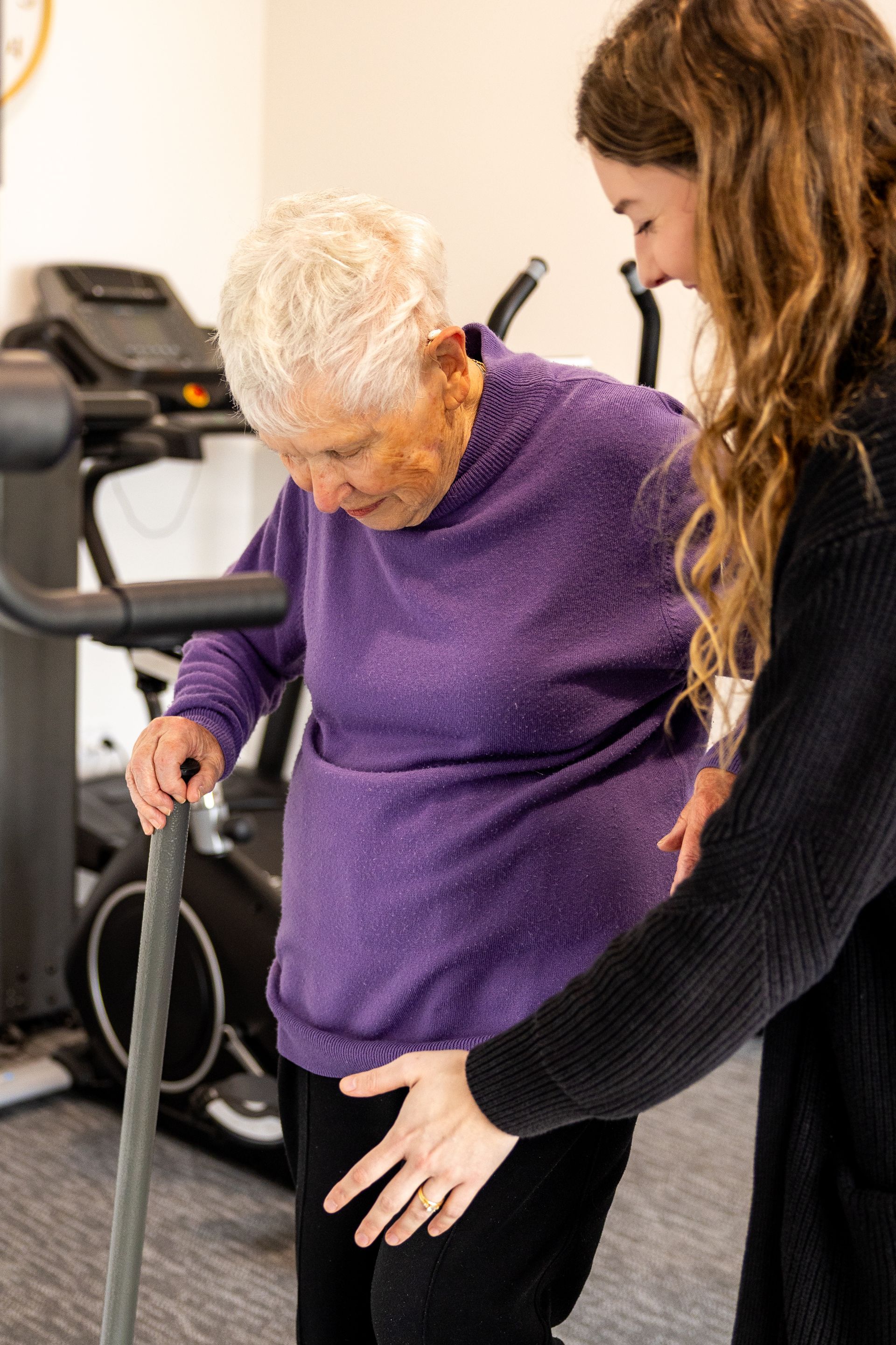 Physical Therapist Assisting a Patient With Arm Exercises — Forerunner Physio In Taree, NSW