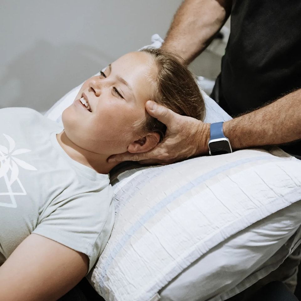 Person Receiving Neck Adjustment — Forerunner Physio In Taree, NSW