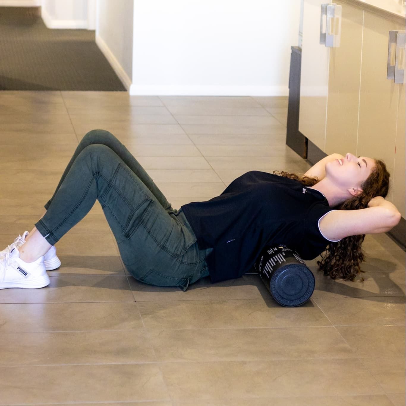 Woman Lying on Her Back — Forerunner Physio In Taree, NSW